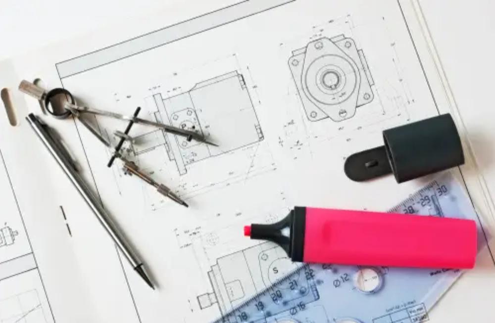 Engineering drawing tools on technical design blueprint